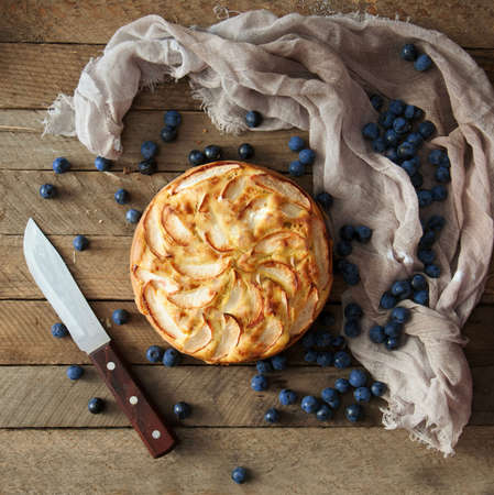 Delicious blueberry pie on a wooden tableの写真素材