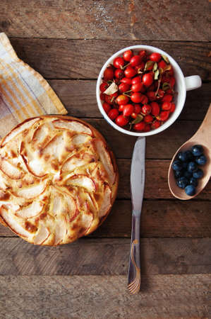 Delicious and beautiful apple pie on a wooden tableの写真素材