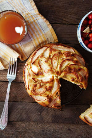 Delicious and beautiful apple pie on a wooden tableの写真素材