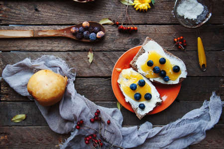 Sweet bread with blueberry, honey, butter and blueberry jam.の写真素材