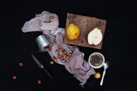 Ripe fresh organic pears on black backgroundの写真素材