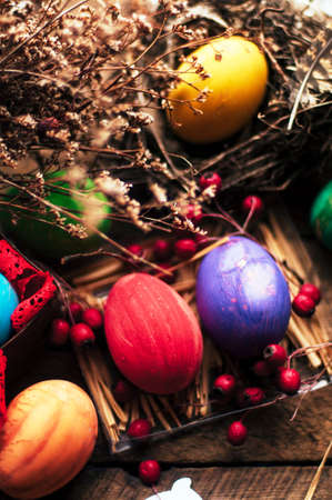 Easter Composition with chicken Eggs on the Warm Wooden Background.