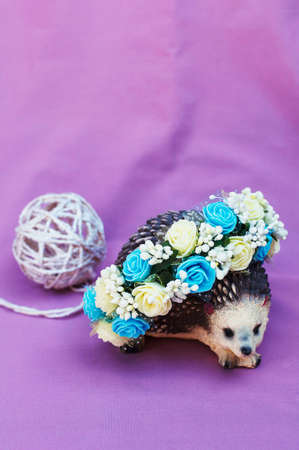 Hoop from flowers, wreath with colored flowers. Handmade flowers wreath on white. Accessory. Artificial flowers. Hair accessories. Beauty. Fashion. Decoration for the head. Wreath hair.の写真素材