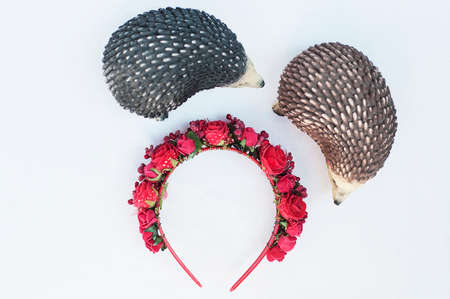 Hoop from flowers, wreath with colored flowers. Handmade flowers wreath on white. Accessory. Artificial flowers. Hair accessories. Beauty. Fashion. Decoration for the head. Wreath hair.の写真素材