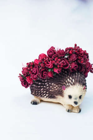 Hoop from flowers, wreath with colored flowers. Handmade flowers wreath on white. Accessory. Artificial flowers. Hair accessories. Beauty. Fashion. Decoration for the head. Wreath hair.の写真素材