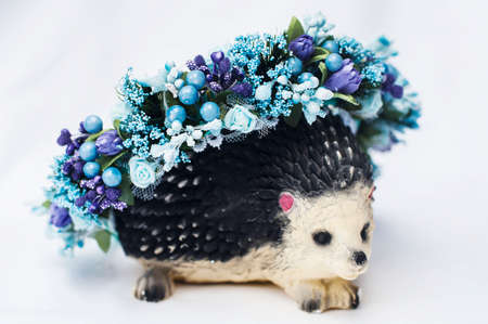 Hoop from flowers, wreath with colored flowers. Handmade flowers wreath on white. Accessory. Artificial flowers. Hair accessories. Beauty. Fashion. Decoration for the head. Wreath hair.の写真素材