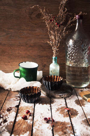 Homemade cupcakes onto an wooden background. Rustic style. Homemade fresh pastries. Food background.の写真素材