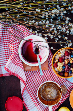 Bowl of oatmeal porridge with blueberry, close up.の写真素材