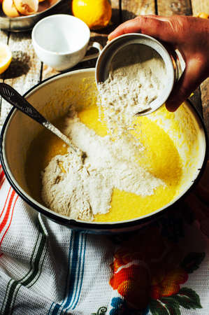 Steps of making chocolate cake : mixing ingredients: bowl, flour, eggs, egg whites foam. See series. step on step recipe. Cooking course or kitchen mess.の写真素材