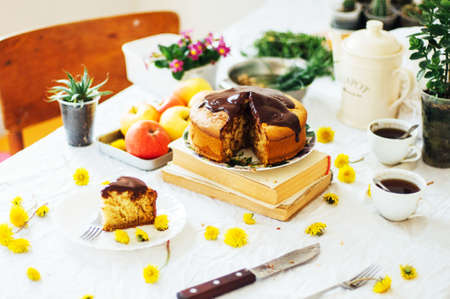 Traditional homemade chocolate cake. Rustic style and natural light. Chocolate Mud Cake  on White table.の写真素材