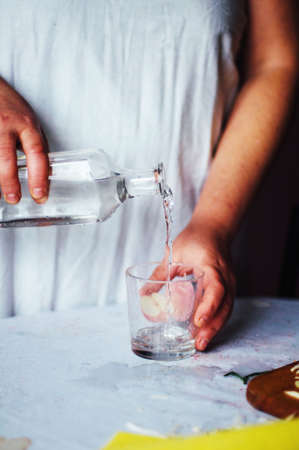 Glass of water. Water pour into glass .の写真素材