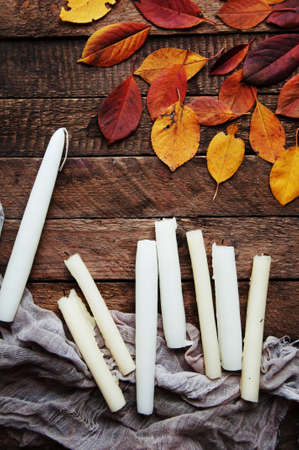 Composition with leaves. Autumn leaves on wooden background, top view, copy space. Autumn background, fall colors, autumn composition still life. Composition of autumn. leavesの写真素材