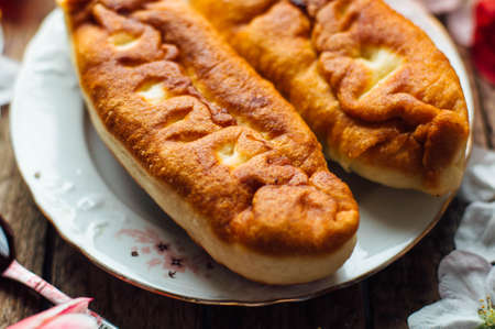 Home made cherry cakes with vanilla and icing sugar. Cherry cakes and slices of cherry cakes....