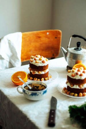 Raspberry Cupcake. Closeup of a cream cake covered with raspberries and gelatin. Raspberry Cake for holidays. Sponge cake with sour cream and raspberry. Cake with cream and berries. Contry kithen stylの写真素材