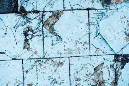 old blue and pink paint texture closeup. blue  and pink cracked and peeling paint background with...
