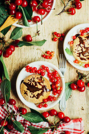 Get the recipe for a scrumptious vegan and processed sugar free cherry and currant cobbler over on Faring Well! Summer dessert, served.の写真素材