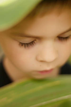 Portrait of an Adorable Boy in outdoor.  Small handsome boy 7 years old posing in the garden...