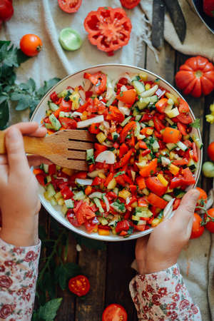 Mixed salad with radish. Caprese Salad. Cherry tomato mozzarella salad. Raw zucchini spaghetti with pesto and cherry tomatoesの写真素材