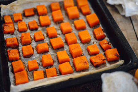 Close up view of baker kneading dough. Homemade bread. Hands preparing bread dough on wooden table. Preparing traditional homemade bread. Woman hands kneading fresh dough for making breadの写真素材