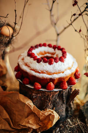 Tart with strawberries and whipped cream decorated with mint leaves. Top viewの写真素材