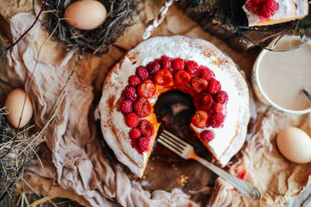 Tart with strawberries and whipped cream decorated with mint leaves. Top viewの写真素材