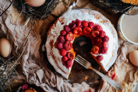 Tart with strawberries and whipped cream decorated with mint leaves. Top viewの写真素材