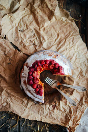 Tart with strawberries and whipped cream decorated with mint leaves. Top viewの写真素材