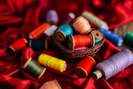 Sewing threads multicolored background closeupの写真素材