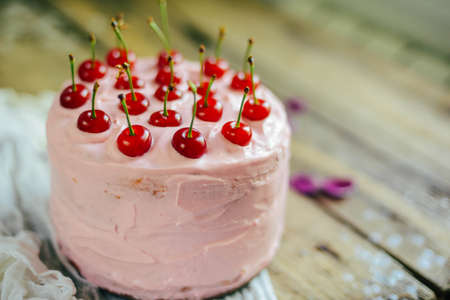 Home made cherry cake with vanilla and icing sugarの写真素材