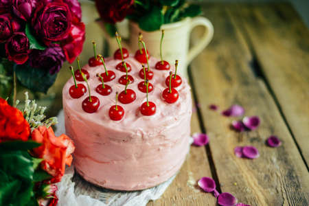 Home made cherry cake with vanilla and icing sugarの写真素材