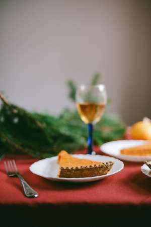 Homemade Pumpkin Pie for Thanksgiving Ready to Eat. Pumpkin pie with autumn decorationsの写真素材