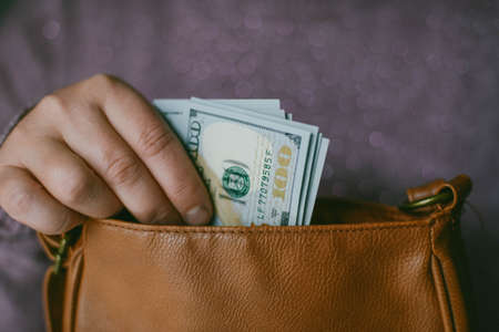 American dollars bank note in hand American dollars bank note in handの写真素材