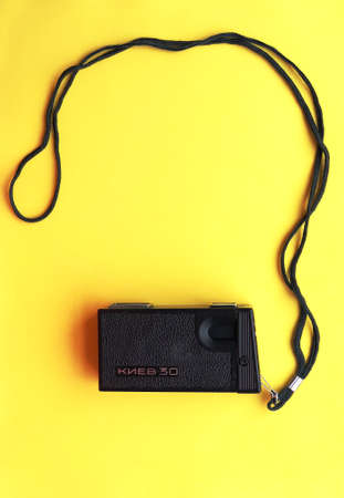 UKRAINE, KYIV - MARCH 28, 2018: Flat lay vintage camera on pastel backgroundのeditorial素材