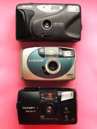 UKRAINE, KYIV - MARCH 28, 2018: Flat lay vintage camera on pastel backgroundのeditorial素材