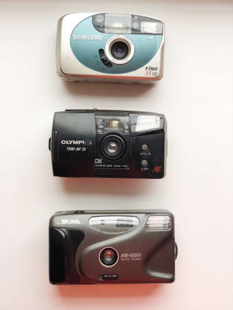 UKRAINE, KYIV - MARCH 28, 2018: Flat lay vintage camera on pastel backgroundのeditorial素材