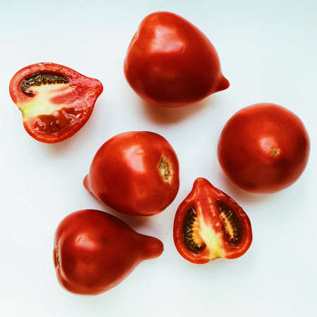 fresh red tomatoes isolated on white background. flat layの写真素材