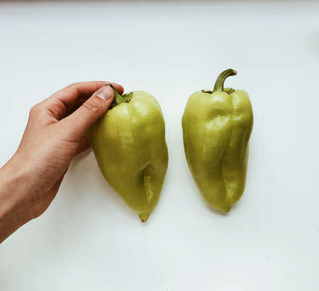 green sweet bell pepper isolated on white background. flat layの写真素材