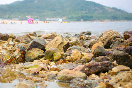 Seaside stones in Daya Bay, Huizhou city, Guangdong Province, Chinaの写真素材