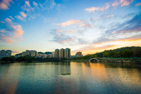 The city landscape of South Lake by Huizhou West Lake Scenic Area, Huizhou city, Guangdong, Chinaの写真素材
