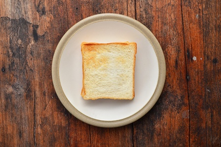 Bread on white dish の写真素材