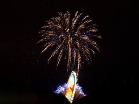 Bonfire night with fairground rideの写真素材