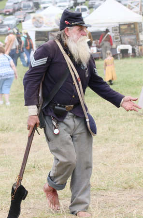 Civil War reenactor portraying a wounded soldier at the 150th anniversary of the Battle of Gettysburg, June 28, 2013.のeditorial素材