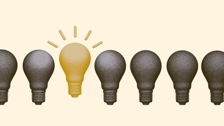 Among rows of bulbs, one stands out, symbolizing an idea and career concept focused on...