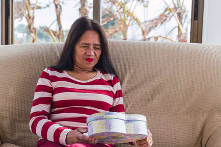 Asian women very happy because of her valentines giftの写真素材