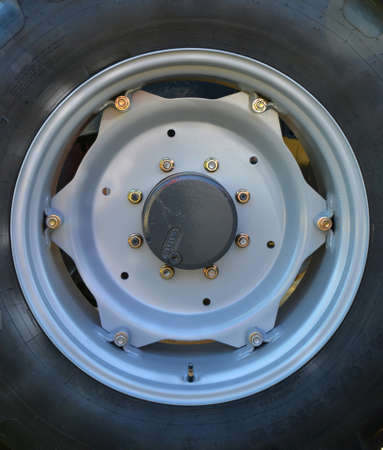 grey rim of a new tractor at an Exhibitionの写真素材