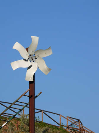 simulated windmill made of recycled material