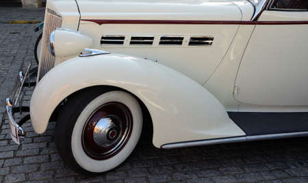 Classic car  Detail lateral of vintage white car の写真素材