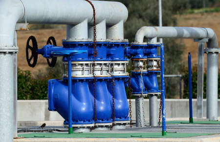 partial view of a drinking water treatment plant with valves and pipesの写真素材