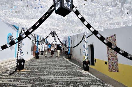 Flower Festival Festas do Povo, Campo Maior 2015. Many streets of the historic center are coated With Thousands of paper flowers, handmade by the people of Campo Maior. Photo taken on: August 24th, 2015.のeditorial素材