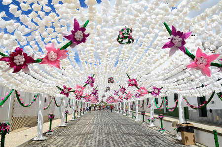 Flower Festival Festas do Povo, Campo Maior 2015. Many streets of the historic center are coated With Thousands of paper flowers, handmade by the people of Campo Maior. Photo taken on: August 24th, 2015.のeditorial素材
